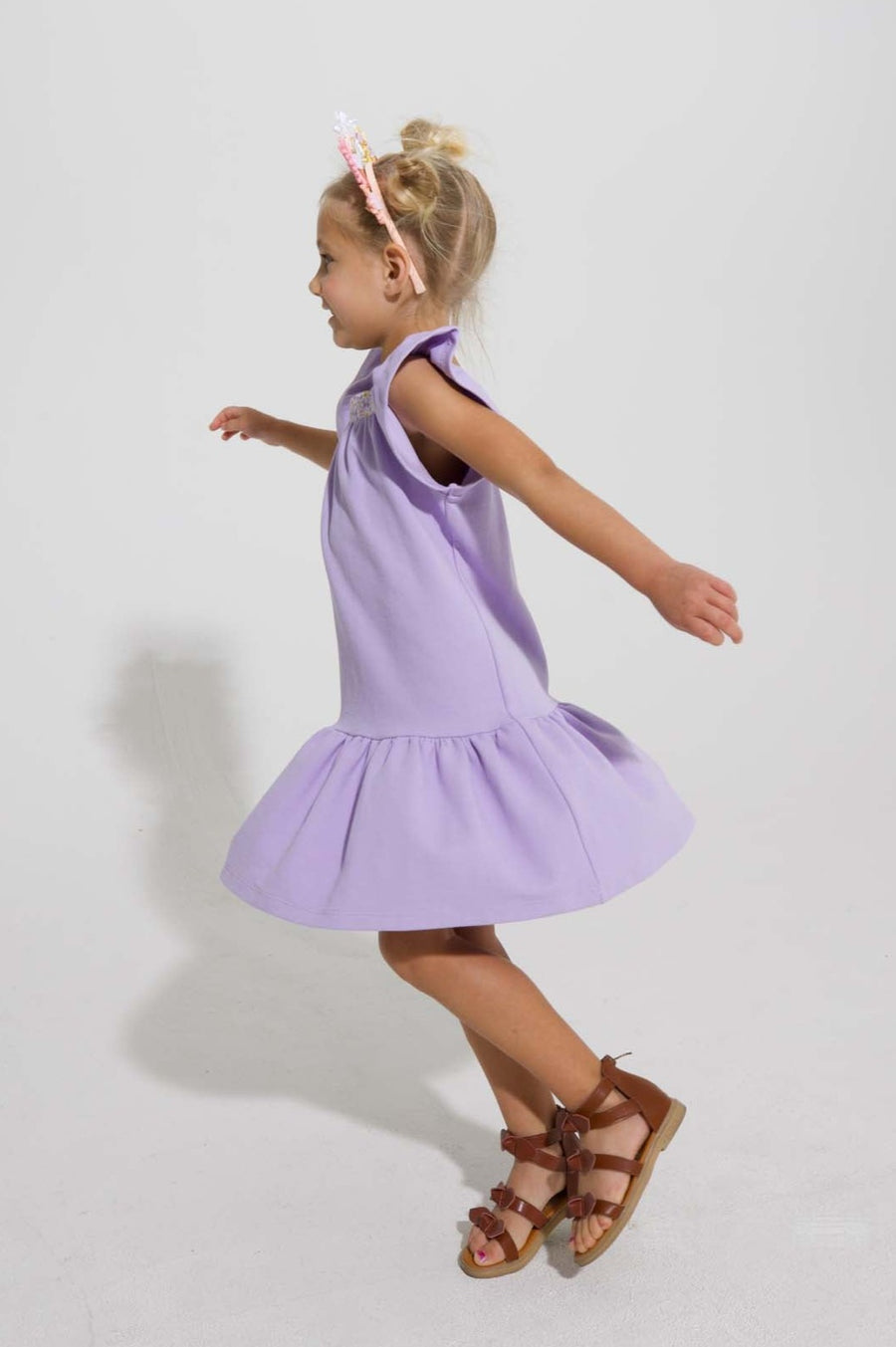 tween girls drop hem dress with floral trim around the neck