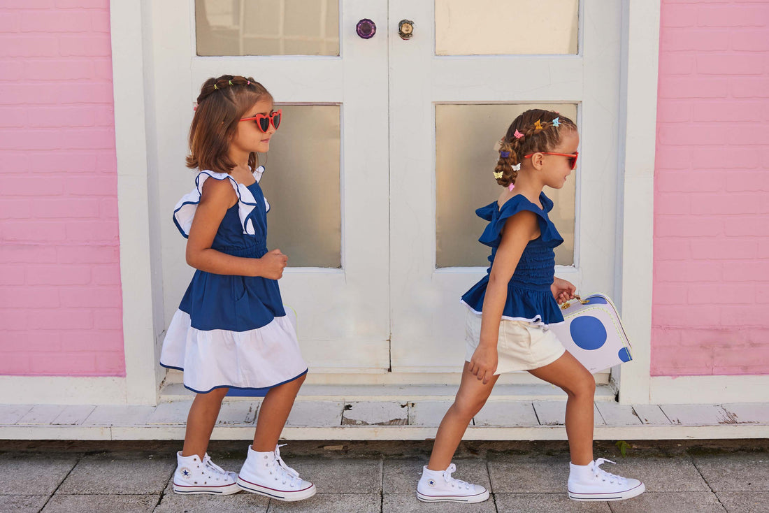 tween girls navy and white dress with cinched waist and ruffle sleeves 