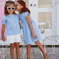 tween girls short sleeve top with buttons in periwinkle floral pattern