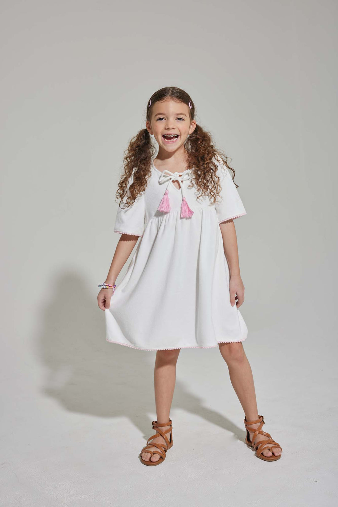 tween girls white terry cloth dress with pink trim and pink tassels