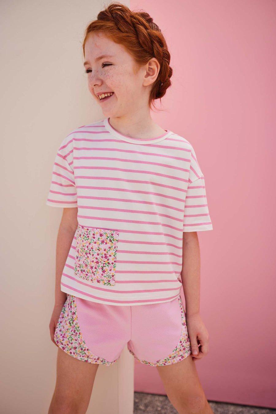tween girls pink track shorts with floral detail on the sides