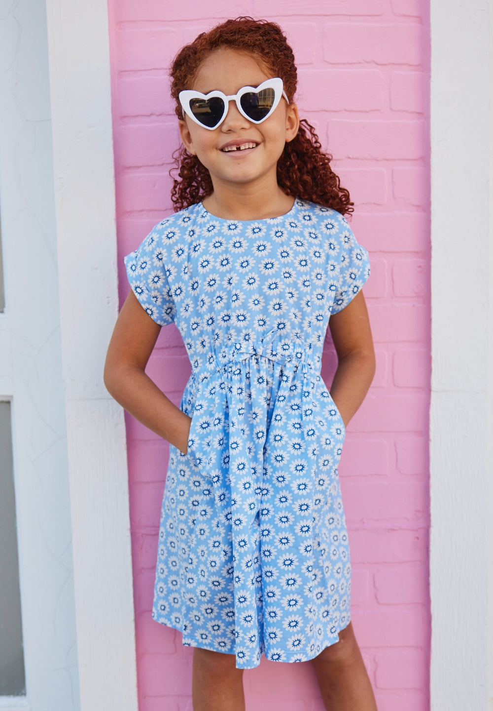 tween girls short sleeved dress with bow detail in blue and white floral pattern